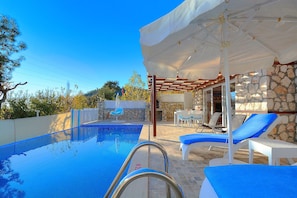 Outdoor pool, pool umbrellas, pool loungers