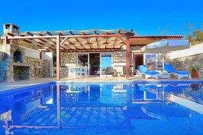 Outdoor pool, pool umbrellas, pool loungers