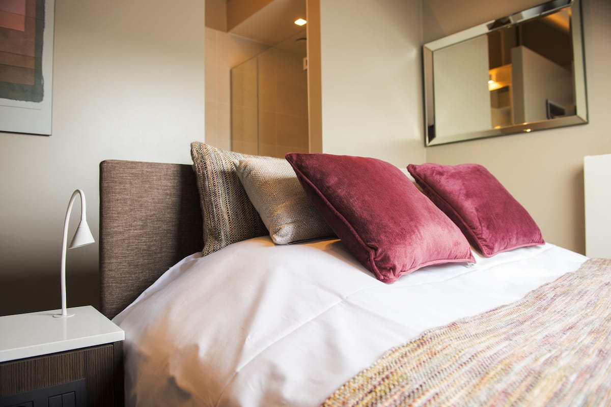 Premium bedding, free minibar items, in-room safe