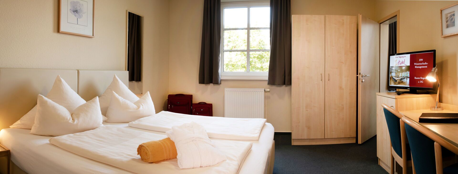 desk, laptop workspace, blackout curtains, iron/ironing board