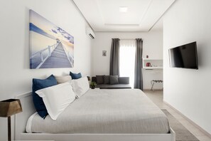 Habitación triple de lujo | 1 habitación, sábanas de algodón egipcio y ropa de cama de alta calidad 