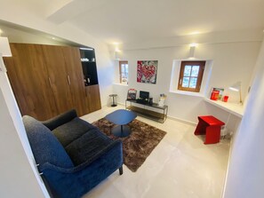 Suíte luxo, suíte, vista para a montanha | Lounge