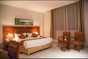 Premium bedding, minibar, in-room safe, individually furnished - Tiffany Diamond Hotels (Dar es Salaam)