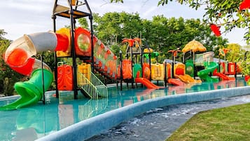 A water park with slides and play structures.