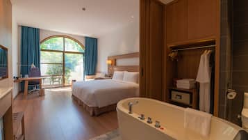 Superior Room, 1 King Bed | Bathroom | Combined shower/tub, spring water tub, rainfall showerhead