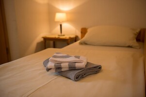 Desk, blackout drapes, soundproofing, rollaway beds