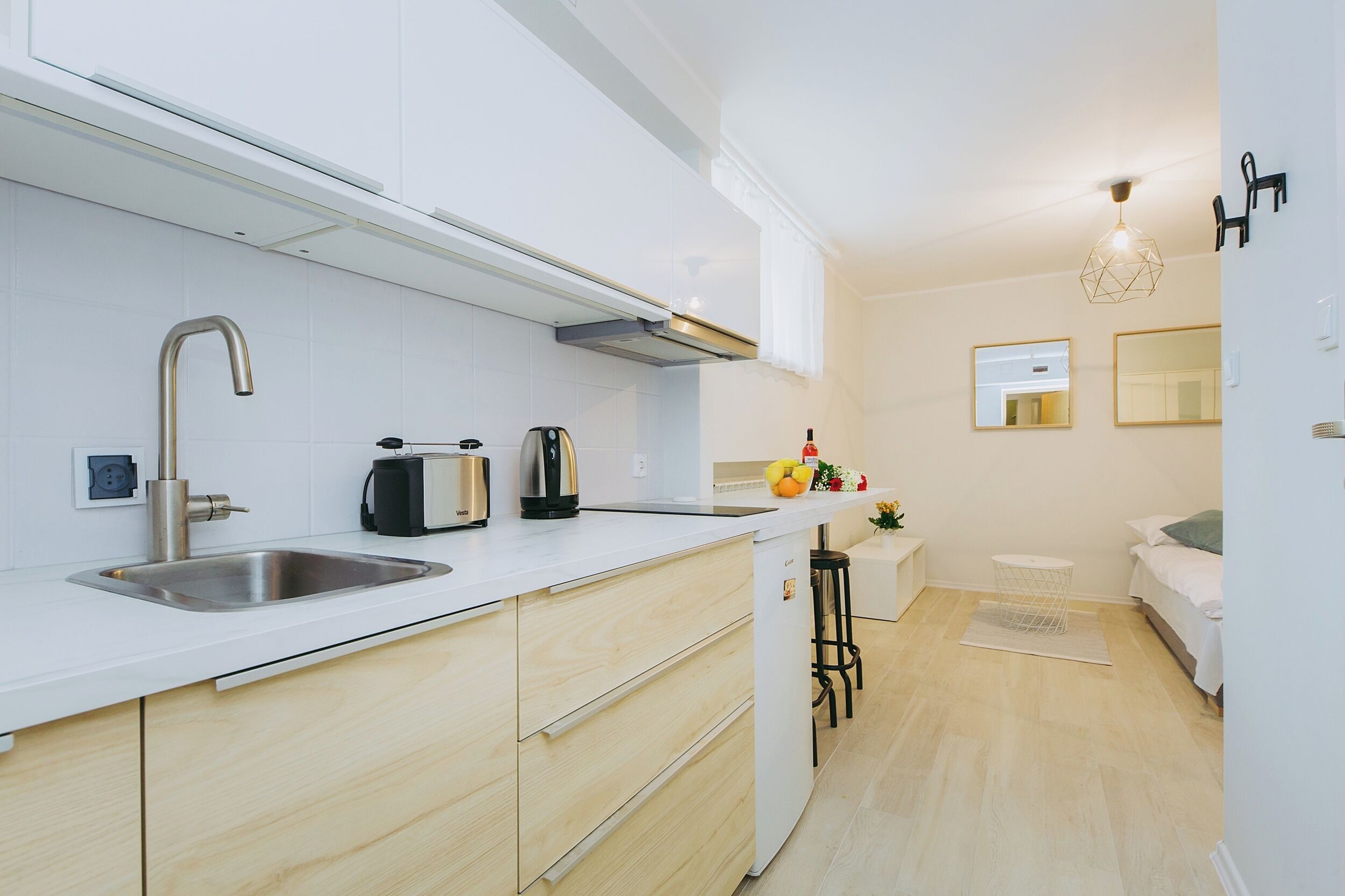 Fridge, stovetop, electric kettle, cookware/dishes/utensils
