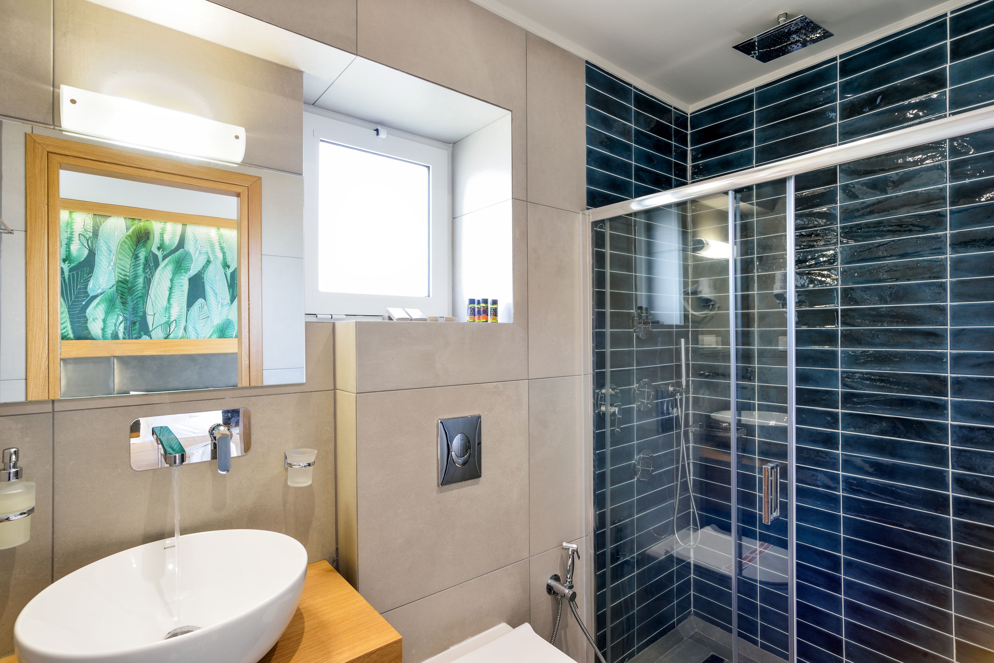 one bedroom suite with terrace and sea view | bathroom | shower, free toiletries, hair dryer, bathrobes