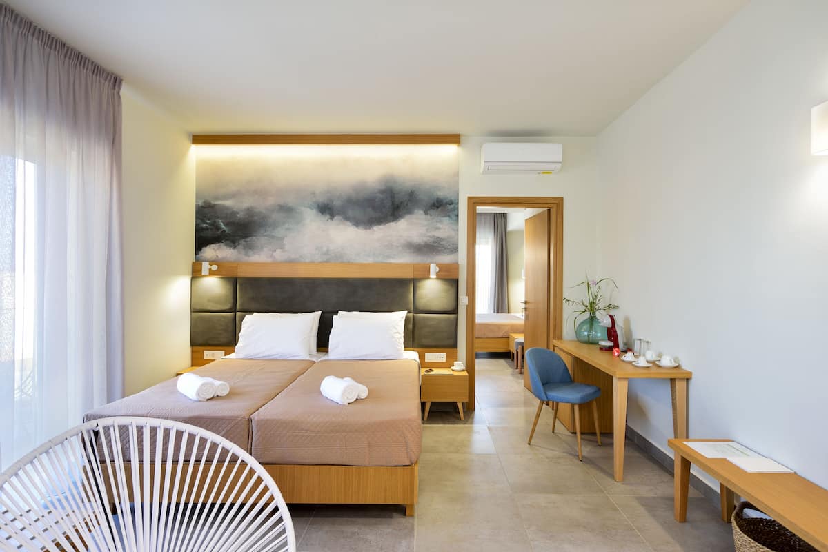Two Bedroom Suite with Balcony | 1 bedroom, in-room safe, desk, laptop workspace