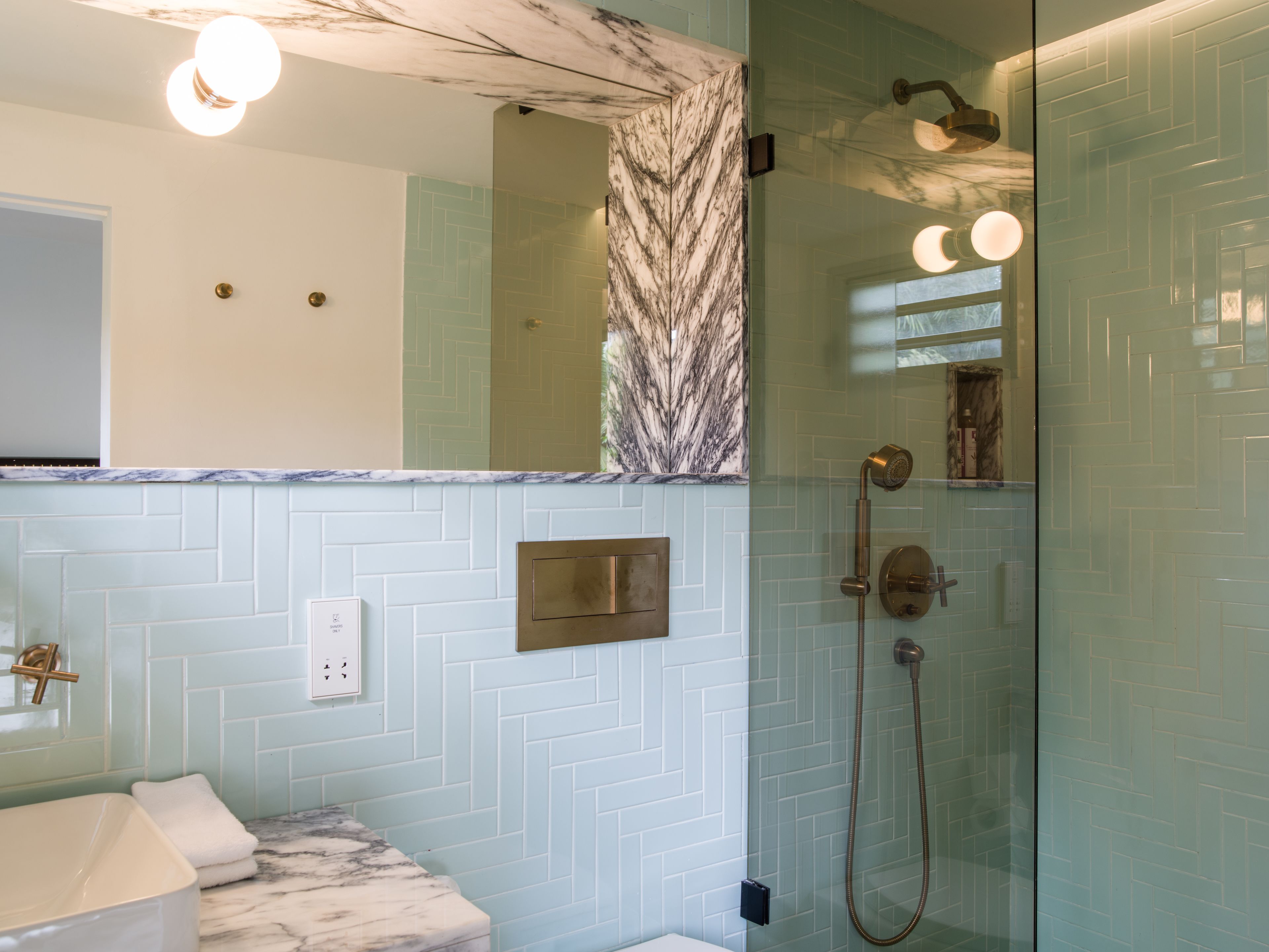 shower, rainfall showerhead, designer toiletries, hair dryer