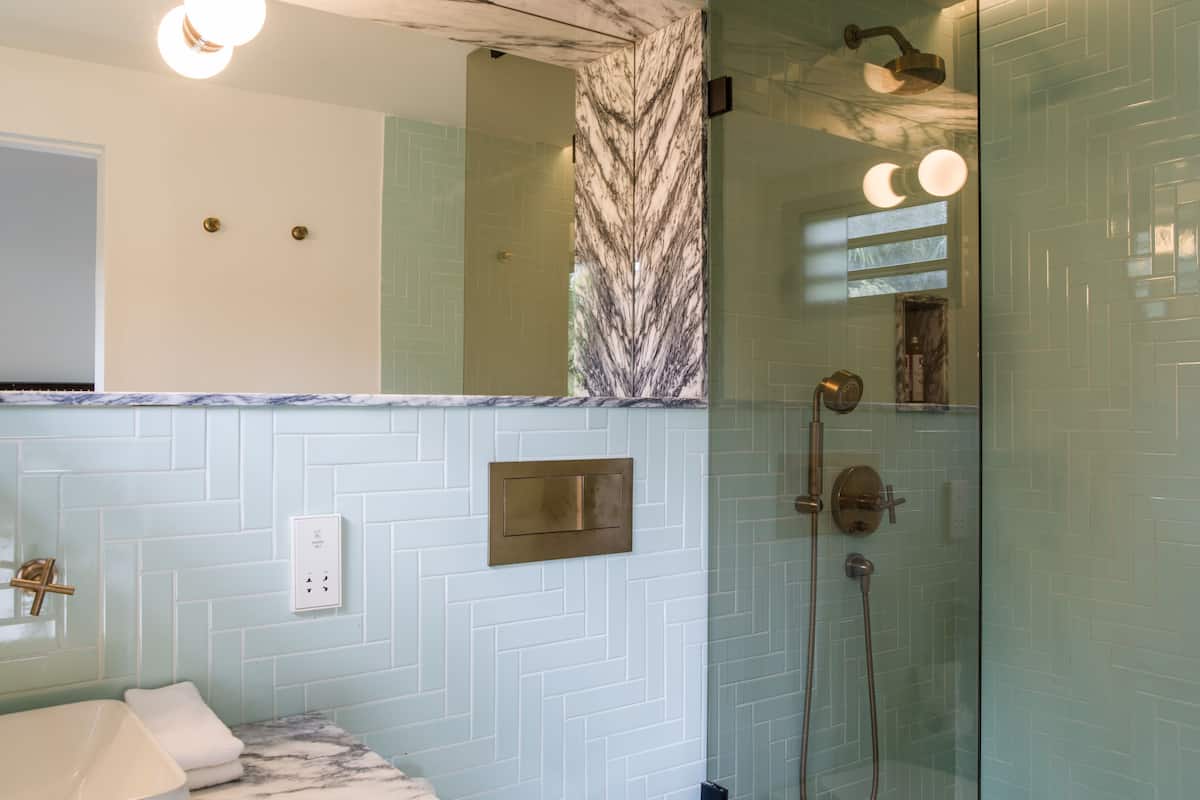 shower, rainfall showerhead, designer toiletries, hair dryer