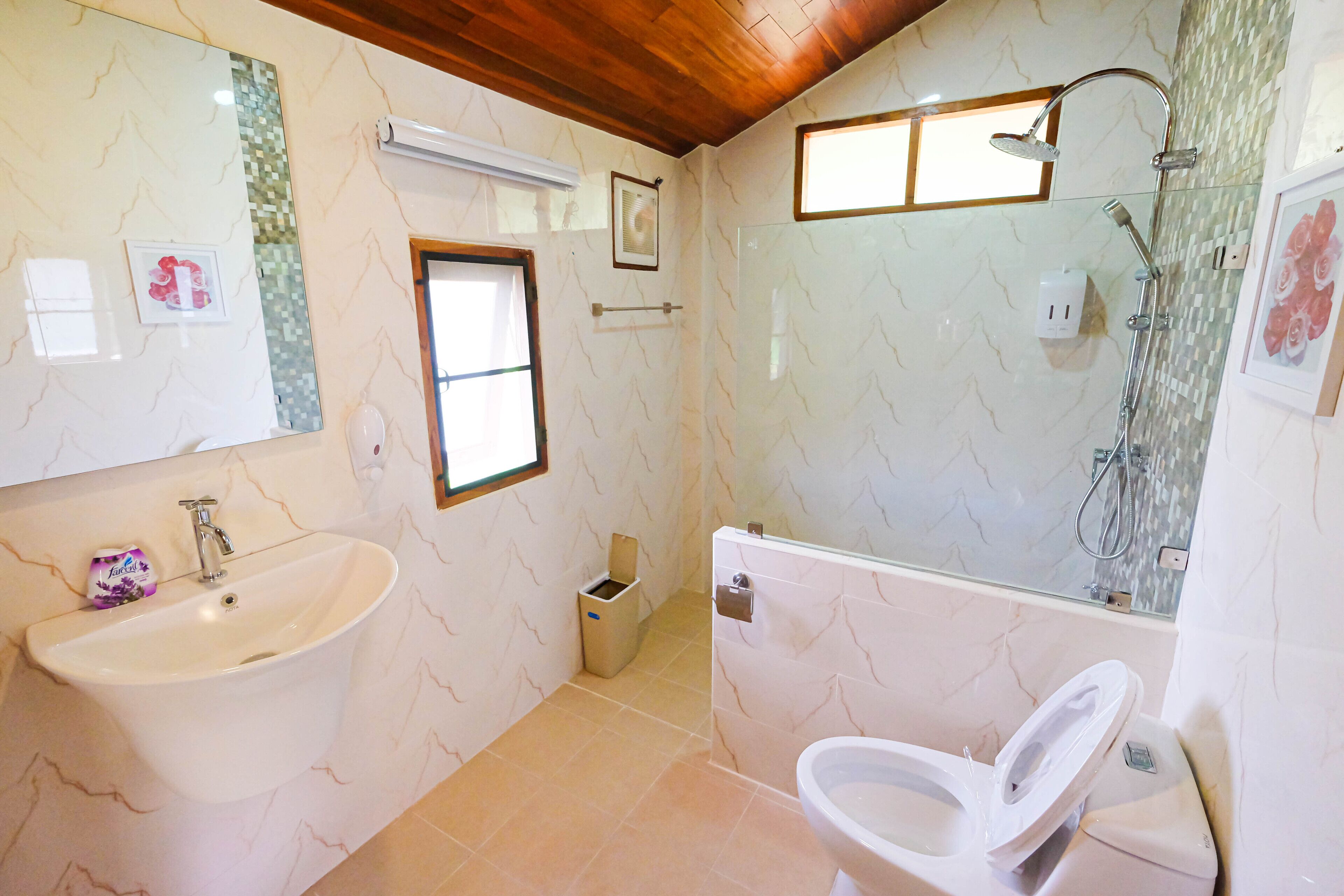 superior room | bathroom | shower, rainfall showerhead, free toiletries, hair dryer