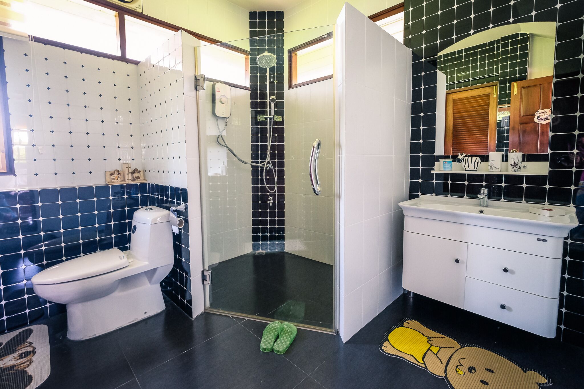 superior suite | bathroom | shower, rainfall showerhead, free toiletries, hair dryer