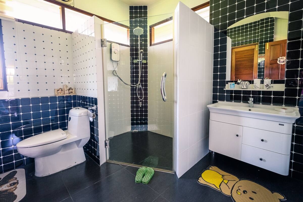 superior suite | bathroom | shower, rainfall showerhead, free toiletries, hair dryer