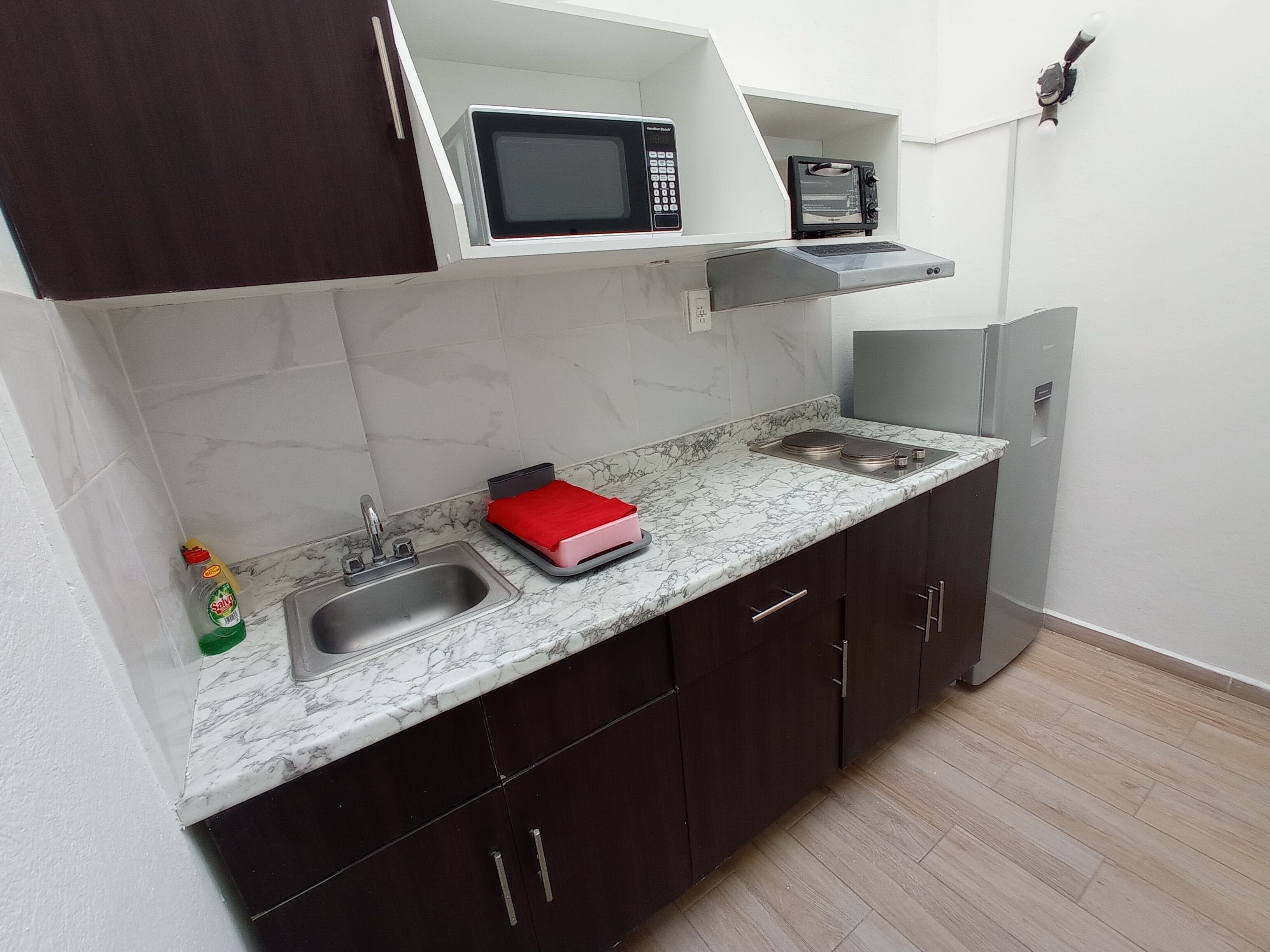 Comfort Loft | Private kitchenette | Shared fridge, microwave
