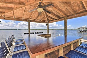 Outdoor dining - Waterfront Winter Haven Home with Dock & Hot Tub! (Winter Haven)
