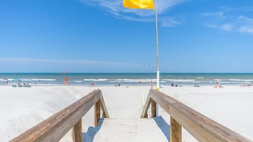 On the beach, sun-loungers, beach towels