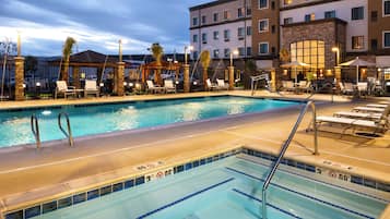 Outdoor pool, open 8:00 AM to 10:00 PM, pool umbrellas, pool loungers