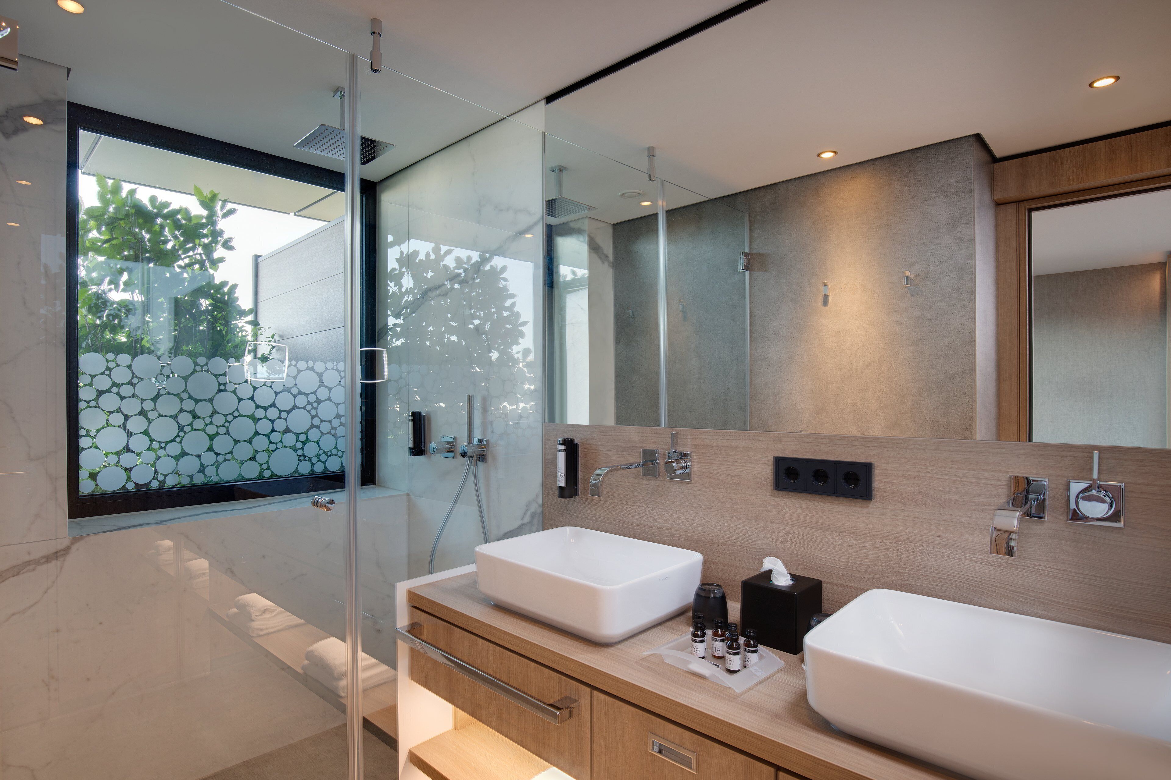 shower, hair dryer, bathrobes, slippers