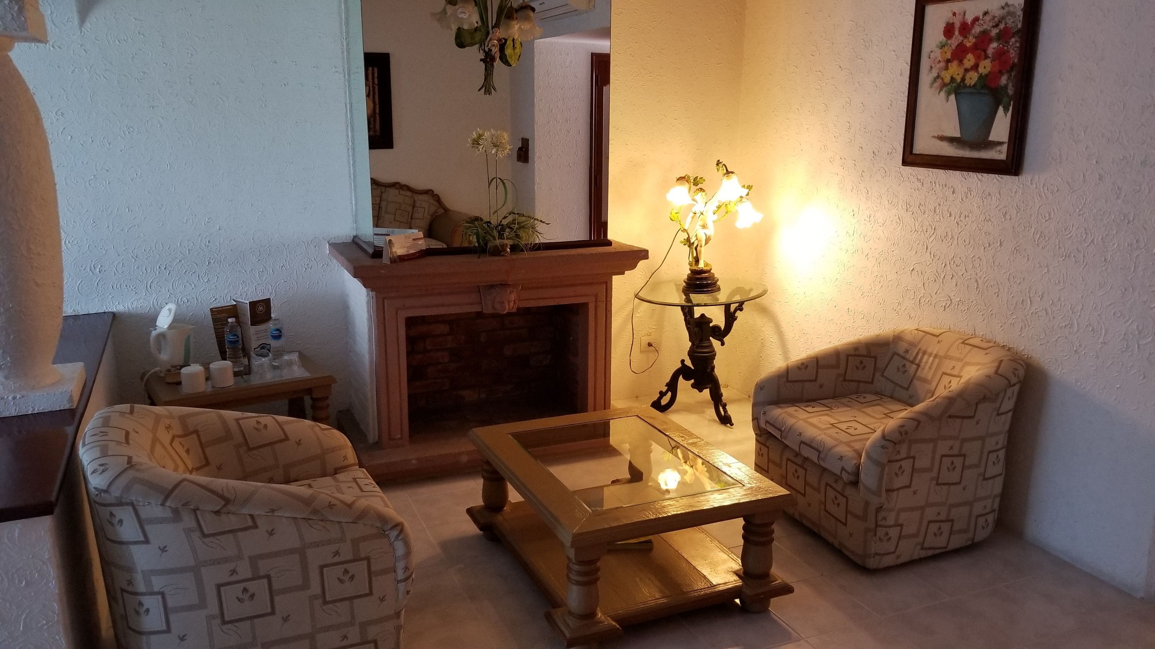 standard double room, 1 king bed, garden view | in-room safe, desk, laptop workspace, blackout curtains