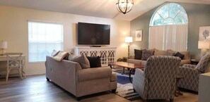 Télévision à écran plat, jeux vidéo, lecteur de DVD