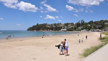 On the beach, sun-loungers