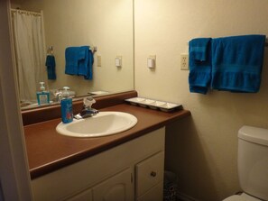 Combined shower/bathtub, hair dryer, towels, soap