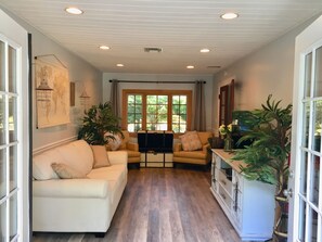 TV, fireplace, books