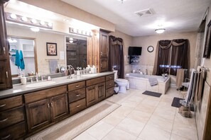 Combined shower/bathtub, jetted bath, hair dryer, towels