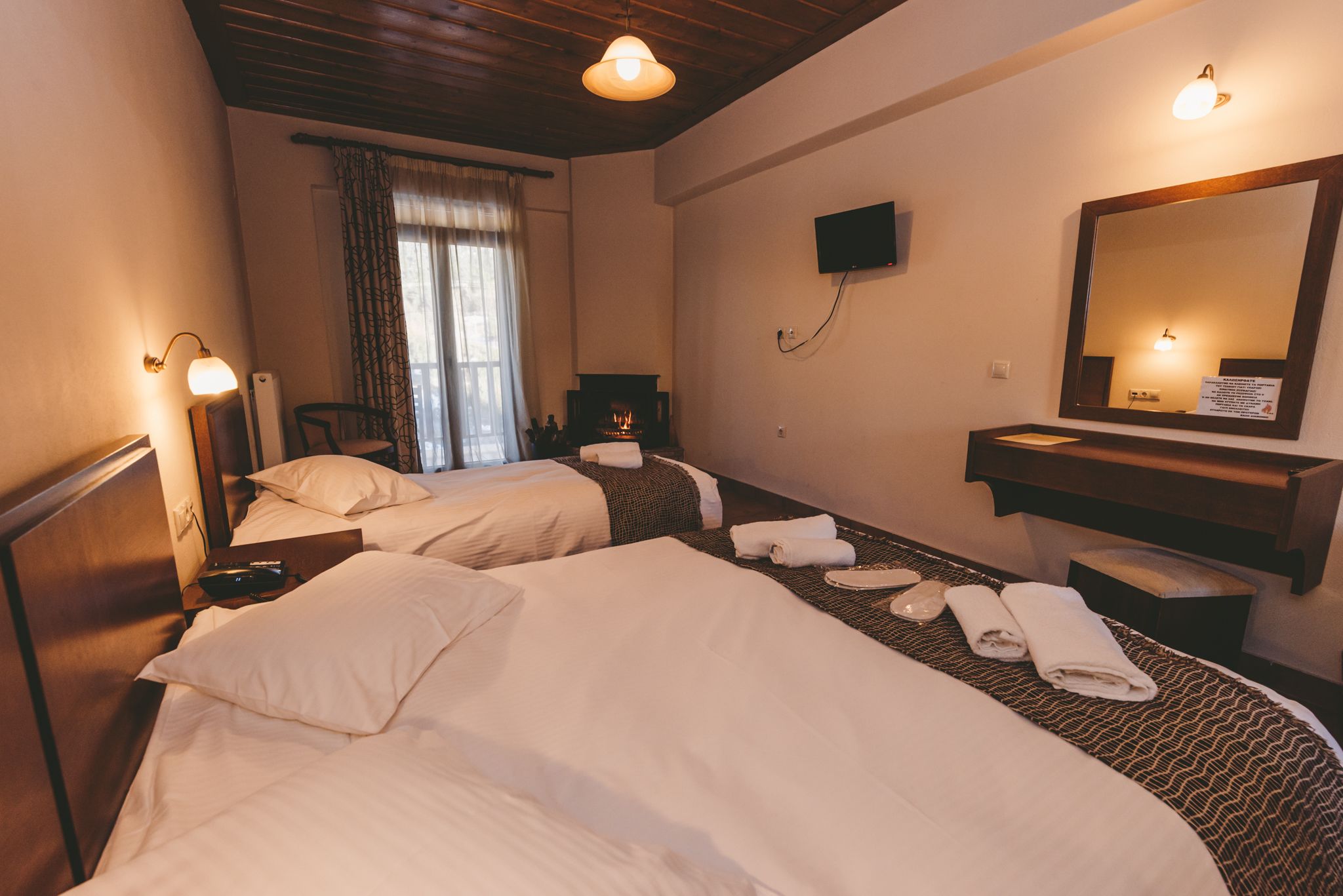 triple room, fireplace, mountain view | premium bedding, down duvets, minibar, in-room safe