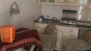 Villa, 4 Bedrooms | Private kitchen | Coffee/tea maker, fridge, microwave, oven