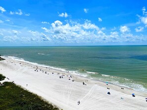 On the beach, sun-loungers, beach towels