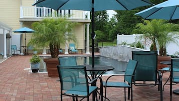 Seasonal outdoor pool, pool umbrellas, pool loungers