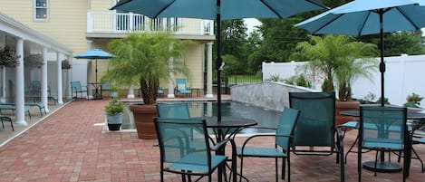 Seasonal outdoor pool, pool umbrellas, pool loungers