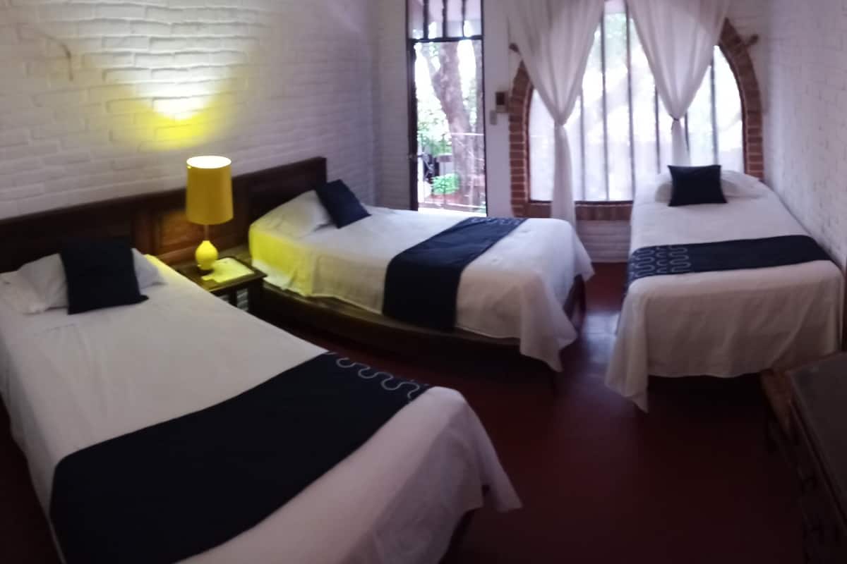 Standard Triple Room | Iron/ironing board, bed sheets