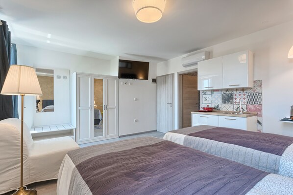 Desk, iron/ironing board, free WiFi, bed sheets