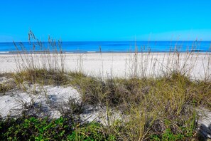 On the beach, sun-loungers, beach towels