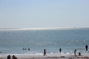 On the beach, sun-loungers, beach towels