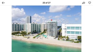 On the beach, sun-loungers, beach towels - Luxury Beachfront Condo • 2 Parking • Fast WiFi • Walk to Dining & Shops (Hollywood)