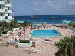 Outdoor pool, a heated pool - Luxury Beachfront Condo • 2 Parking • Fast WiFi • Walk to Dining & Shops (Hollywood)