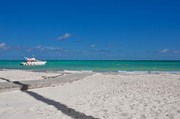 On the beach, beach towels