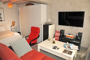 Apartamento | Área de estar | TV de tela plana