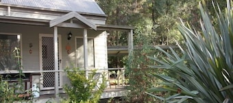 Self contained cottage in 8 acres of amazing gardens adjoining the Ovens River