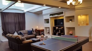 Smart TV, DVD player, foosball, table tennis