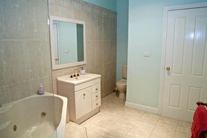 Combined shower/bathtub, jetted bath, hair dryer
