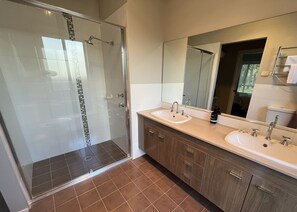 Bathtub, hair dryer, towels, soap