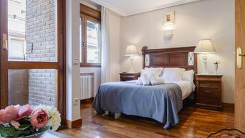 1 dormitorio, sistema de insonorización, tabla de planchar con plancha
