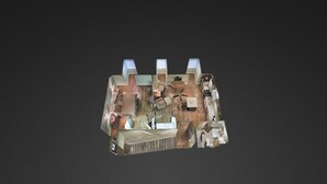 Un modelo 3D de una habitación de hotel con cama, zona de estar y escritorio.