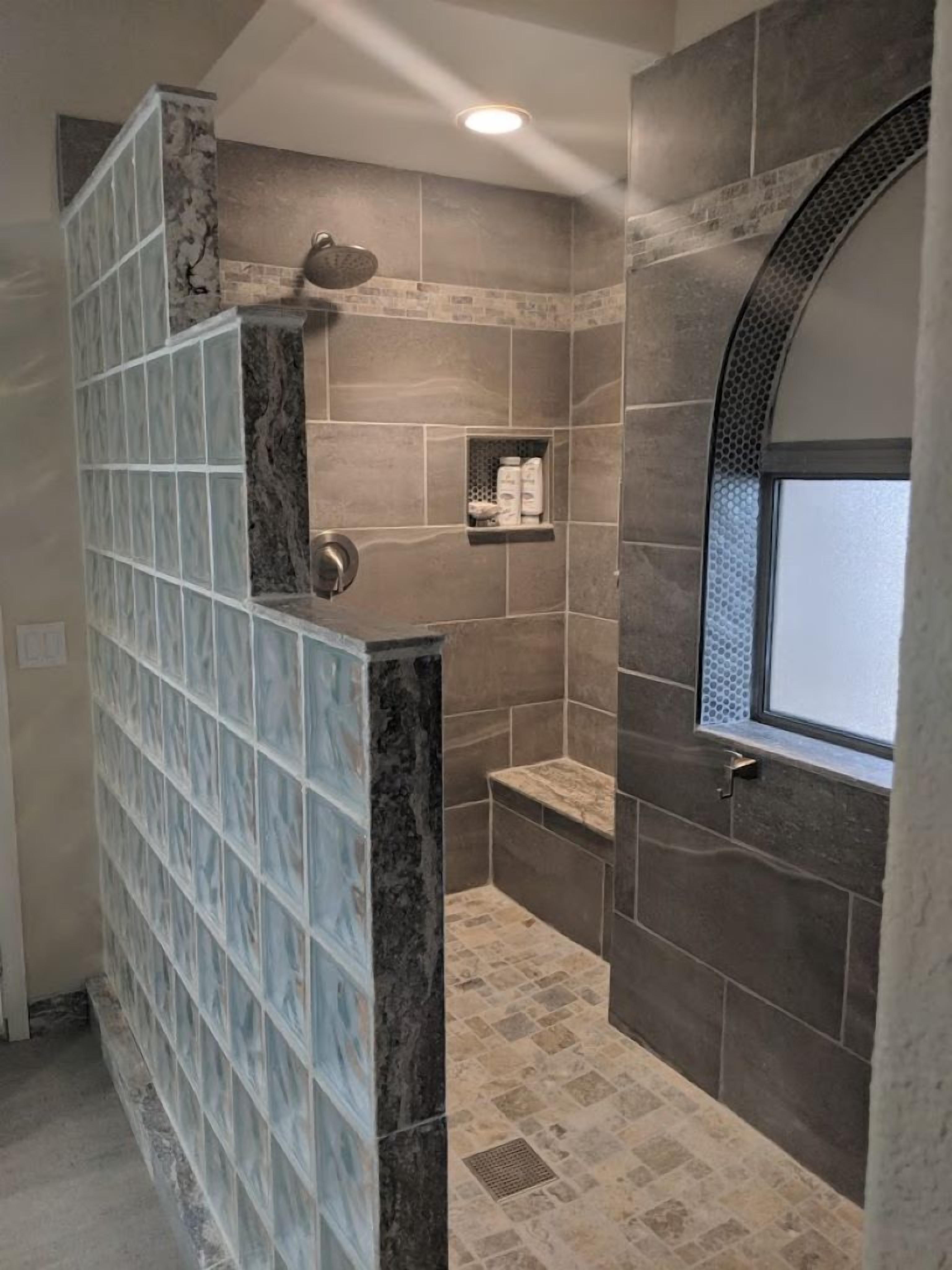 Combined shower/tub, hair dryer, towels, soap