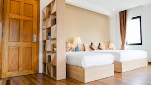 Deluxe Suite | Premium bedding, desk, laptop workspace, blackout drapes - Soleil House Hostel (Hue)
